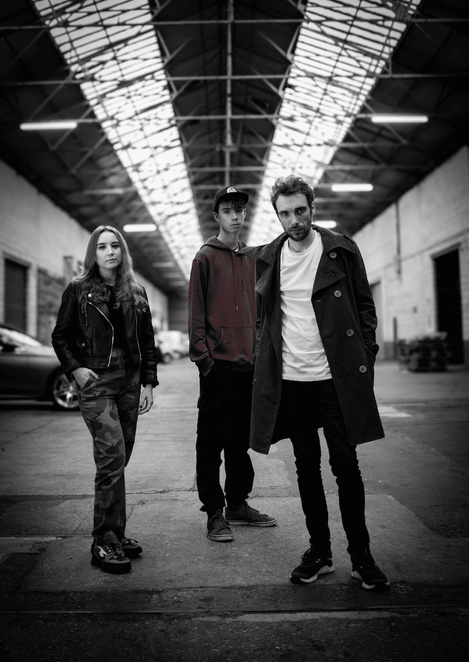 Band promotional photograph in an industrial setting